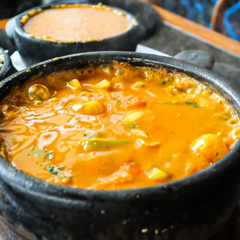 Hera's capixaba moqueca served in a clay pot