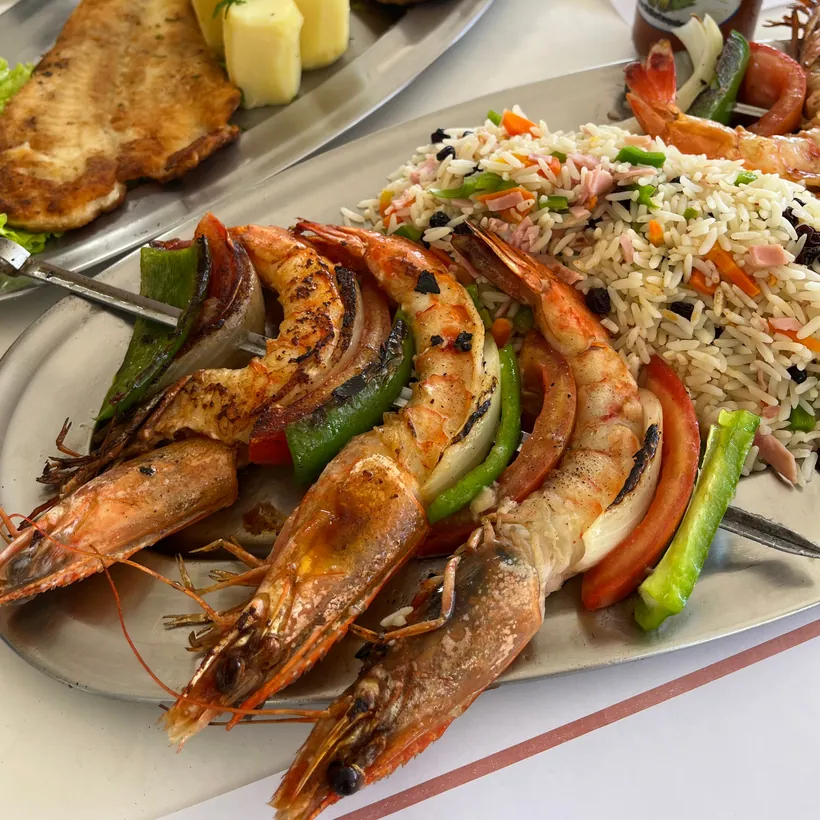 Large grilled prawns served with rice