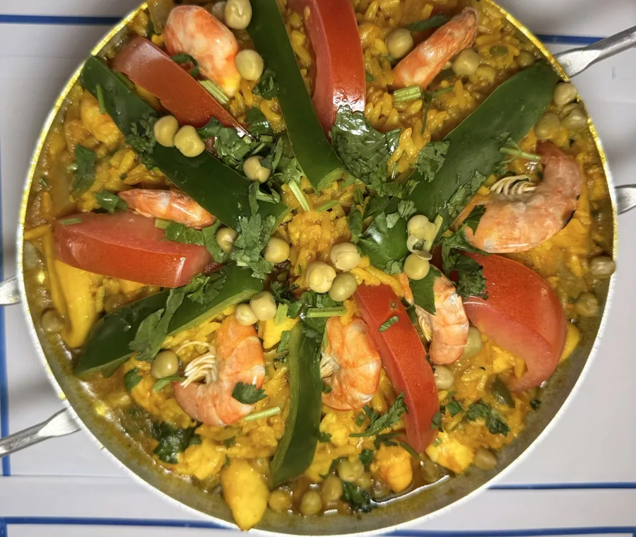 Hera's seafood paella with octopus, squid, shrimp and mussels over saffron rice